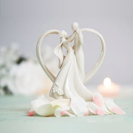 groom dancing with bride cake topper