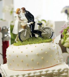 "A Kiss Above" Bicycle Bride And Groom Couple Figurine